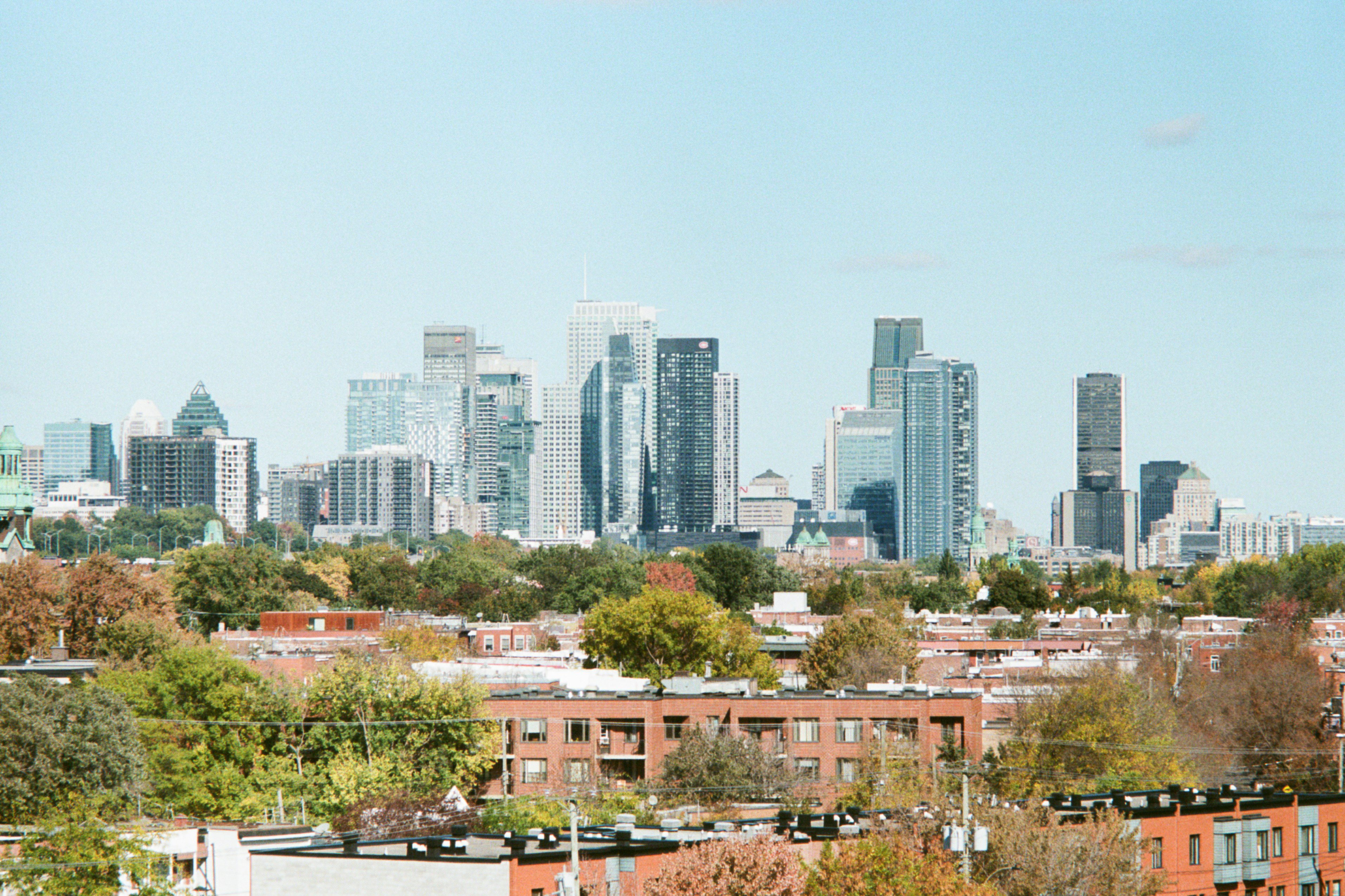 city buildings under white sky during daytime